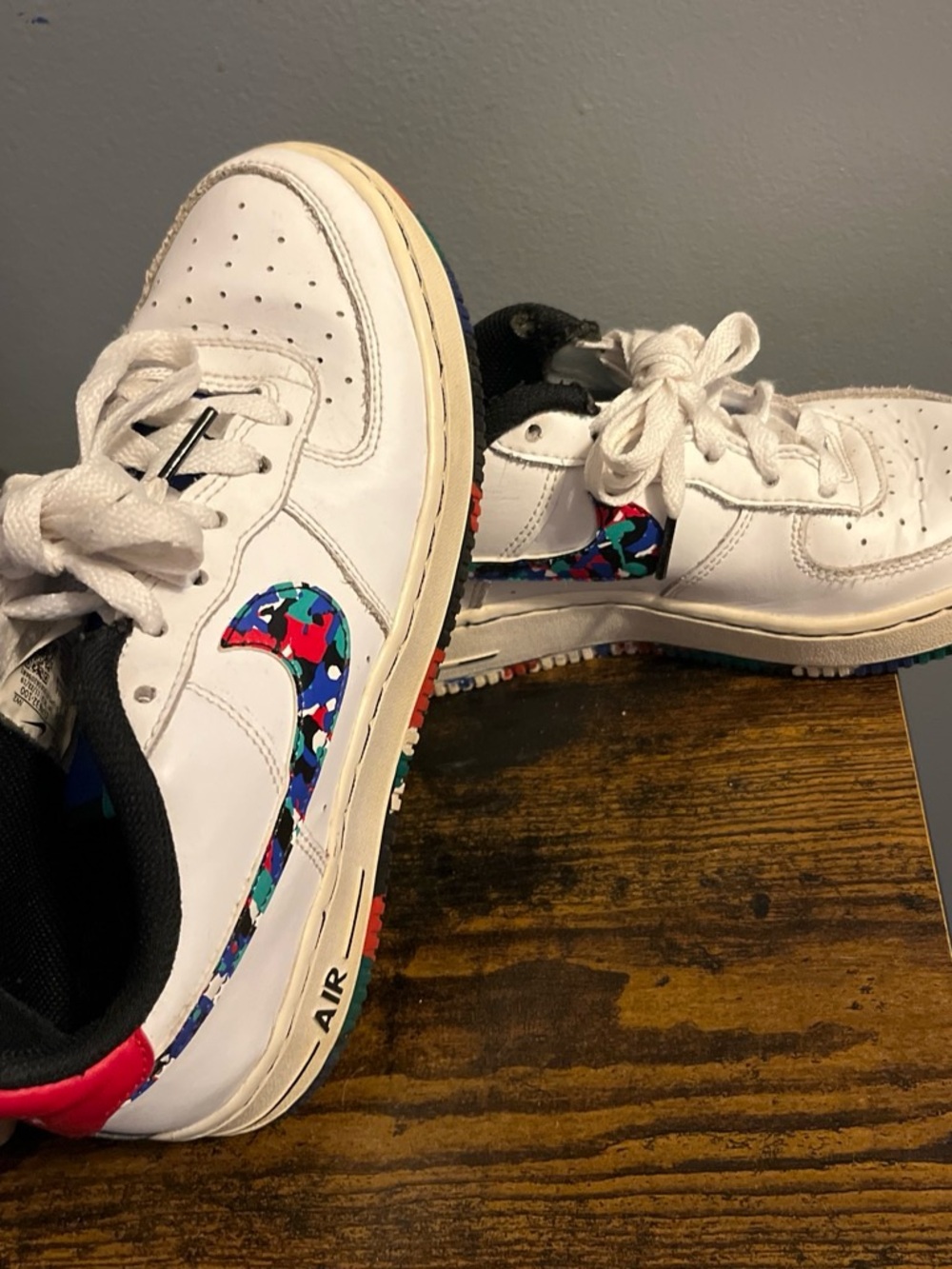 Nike Kids White Sneakers with Multicolor Camo Swoosh